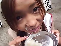 asian girl swallows cum from a plate