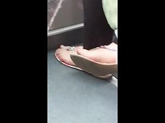 Candid beautiful feet on bus 1