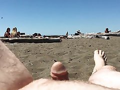 Guy with tiny dick exposes him to girls on the beach